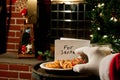 Santa Claus taking a cookie Royalty Free Stock Photo