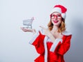 Santa Clous girl with shopping cart