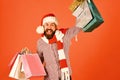 Santa with colorful packets. Black Friday sale concept. Royalty Free Stock Photo