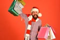 Santa with colorful packets. Black Friday sale concept. Royalty Free Stock Photo