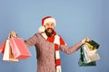 Santa with colorful packets. Christmas shopping and sale concept Royalty Free Stock Photo