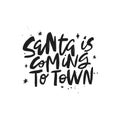 Santa is coming to town vector brush lettering. Handwritten Christmas typography print. Royalty Free Stock Photo