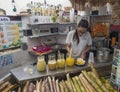 Santa Cruz de la Palma, La Palma, Canary Islands, Spain, December 23, 2019: young woman preparing fresh juice and