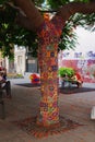 SANTA CRUZ DE TENERIFE, SPAIN, FEBRUARY 2015-Knit pattern mosaic ornament decorated trees in town garden