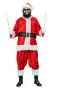 Santa with drumsticks. Arabic young Santa Claus with black beard holds drum stick on white background. Christmas coming