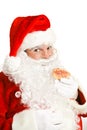 Santa Eating Christmas Cookie Royalty Free Stock Photo