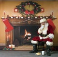 Santa Eating Cookies And Milk Royalty Free Stock Photo