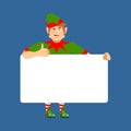 Santa Elf holding banner blank. Christmas helper and white blank Royalty Free Stock Photo