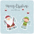 Santa and Elf Snow Angels Royalty Free Stock Photo