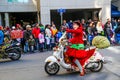 Santa Elves Riding Scooters in Holiday Parade