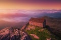 Santa Eufemia hermitage on the top of a mountain at amazing sunrise with fog Royalty Free Stock Photo