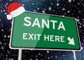 Santa exit here on signpost or billboard against starry sky at christmas or xmas night. Concept Image Royalty Free Stock Photo