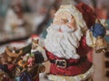 Santa figurine closeup with blurred background. Royalty Free Stock Photo