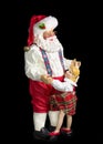 Santa Figurine, Dancing With Little Girl, on Black Background