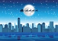 Santa fly over the skyscraper on xmas night Royalty Free Stock Photo