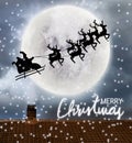 Santa flying over full moon and roof top