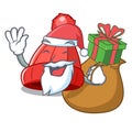 Santa with gift beanie hat isolated on the mascot