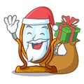 Santa with gift big dressing mirror isolated on mascot Royalty Free Stock Photo