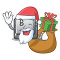 Santa with gift button B in the character shape Royalty Free Stock Photo