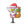 Santa with gift candy vending machine on the cartoon Royalty Free Stock Photo