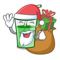 Santa with gift green smoothie mascot cartoon