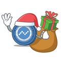 Santa with gift Nano coin mascot cartoon