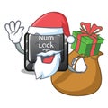 Santa with gift num lock on a keyboard mascot