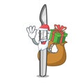 Santa with gift scalpel mascot cartoon style