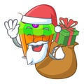 Santa with gift tasty lemon capcake with cartoon funny