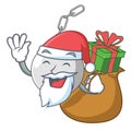 Santa with gift wrecking ball attached character on hitting Royalty Free Stock Photo