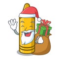 Santa with gift yellow crayon isolated in the mascot