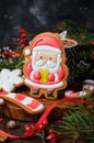Santa Gingerbread Cookie on Wooden Background, Christmas Treat Royalty Free Stock Photo