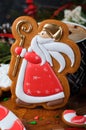 Santa Gingerbread Cookie on Wooden Background, Christmas Treat Royalty Free Stock Photo