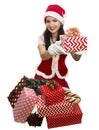 Santa girl giving a present Royalty Free Stock Photo