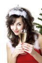 Santa girl with a glass of champagne