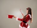 Santa girl magician with copyspace