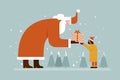 Santa Claus giving a gift to a little girl in a winter background Royalty Free Stock Photo