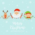 Santa with Happy Elf and Deer Holding Christmas Light Royalty Free Stock Photo