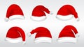 Set of realistic santa hats isolated or claus   hat clothes christmas or santa claus red hat   winter concept. Royalty Free Stock Photo