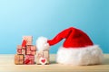 Santa hat with small gift boxes Royalty Free Stock Photo