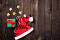 Santa hat, star, ornament and Christmas gift box decorations Royalty Free Stock Photo