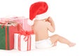 Santa helper baby with christmas gifts Royalty Free Stock Photo