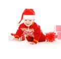 Santa helper baby with christmas gifts Royalty Free Stock Photo