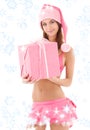 Santa helper girl in pink with gift box Royalty Free Stock Photo