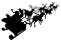 Santa in his Christmas sled or sleigh silhouette Royalty Free Stock Photo