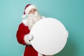 Santa holding a blank cardboard circle