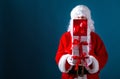 Santa holding Christmas gift boxes Royalty Free Stock Photo