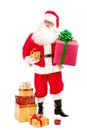 Santa Holding Christmas Present in his Hands on a White Backgrou Royalty Free Stock Photo
