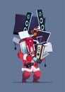 Santa Holding Computer And Modern Electronics Gadgets Cyber Monday Sale Concept