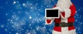 Santa holds an blank tablet for advertising in the camera